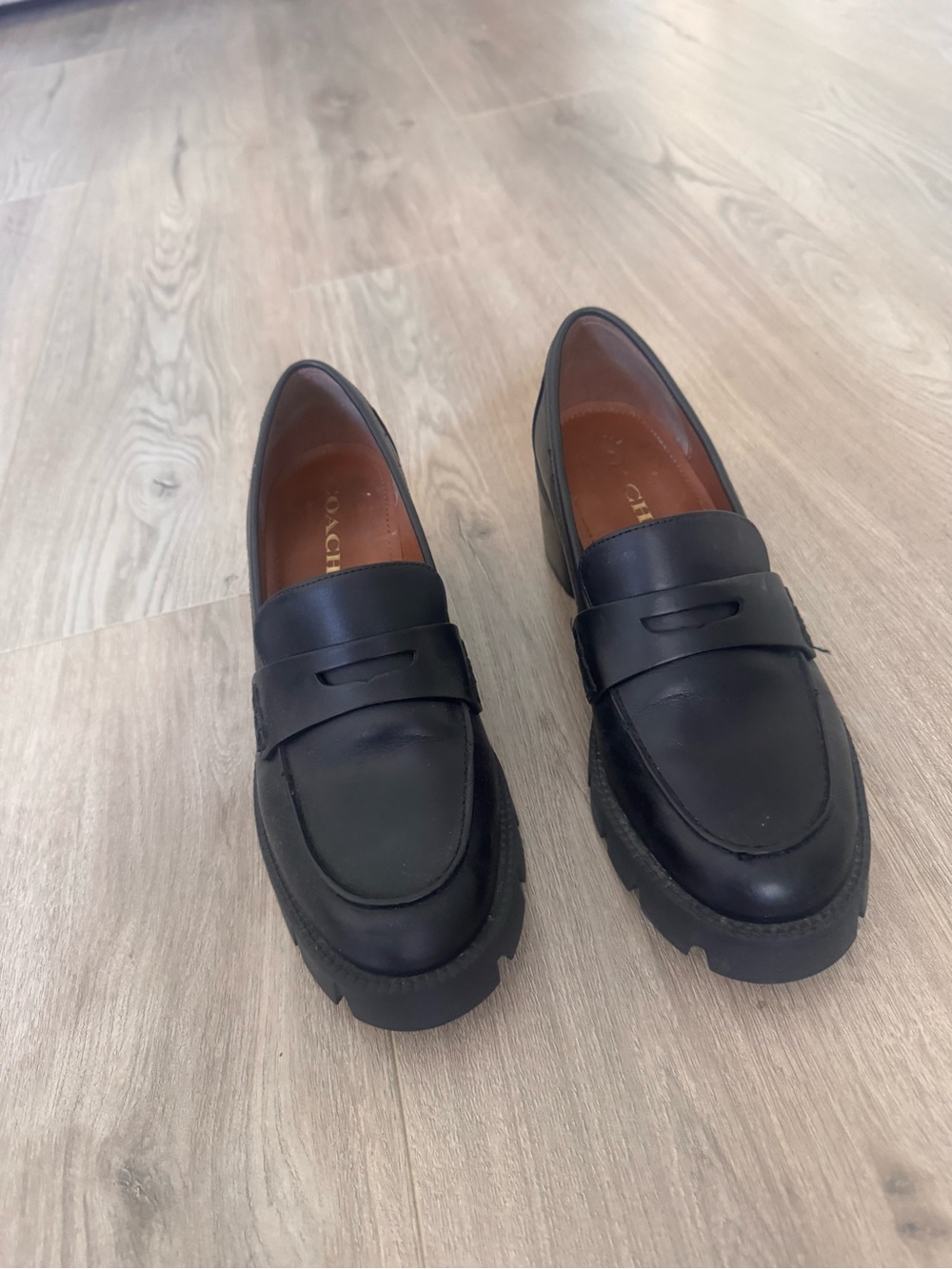 Coach Black Leather Lug Sole Penny Loafers with Tan Lining